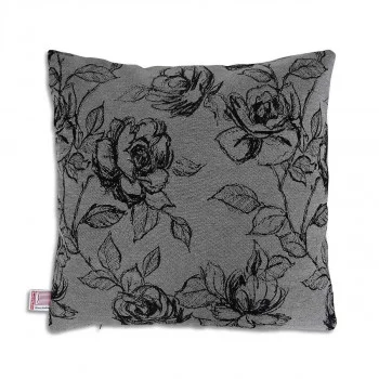 Abgebildet ist ein quadratisches graues Kissen 40x40 cm mit einem schwarzen Blumenmuster, das detaillierte Rosen und Blätter zeigt. An einem Rand des Kissens ist ein kleines Stoffschildchen befestigt. Das Kissen ist vor einem schlichten weißen Hintergrund abgebildet.