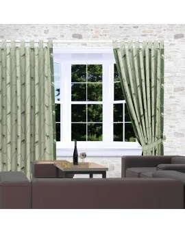 Schlaufenschals Breno mit Steinbock grün am Fenster