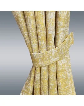 Raffhalter Uland Mostaza in gold an einer Gardine